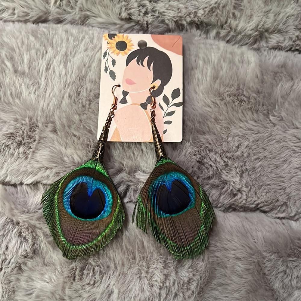 Peacock feather earrings, new in the package!